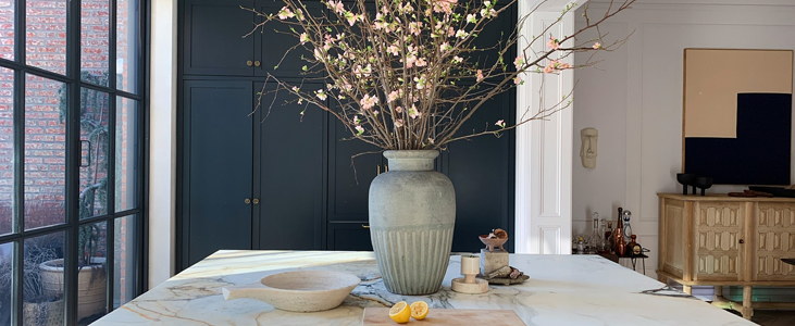 A Terracotta Vessel with Flowers