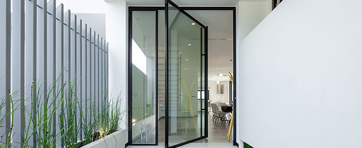 Pivot glass door design